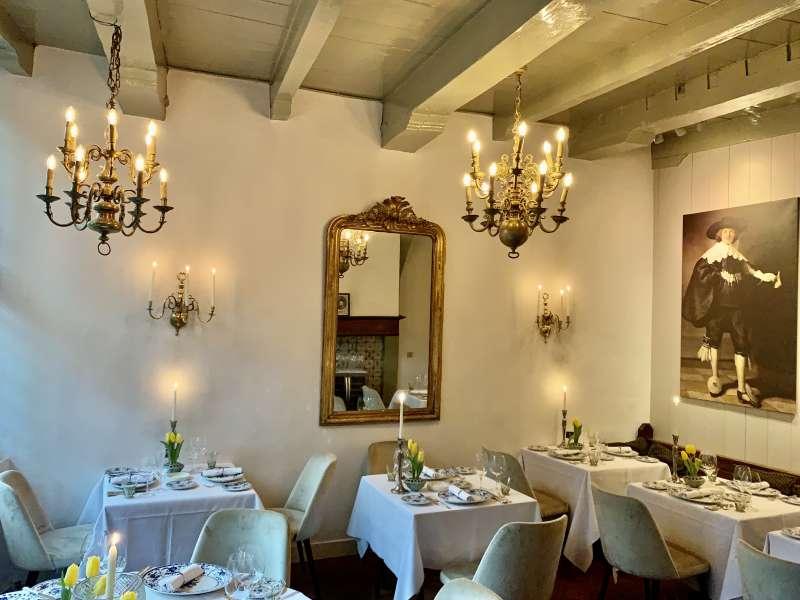 Intimate dinner date setting in Amsterdam for a high-class escort experience